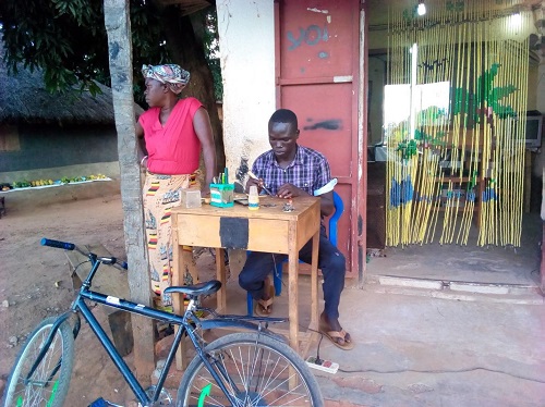 Oloya Kenneth at his workshop 2