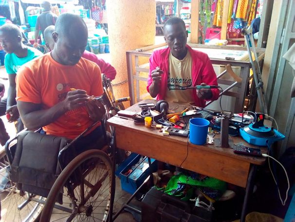 Ocholar Stephen and Okwonga Charles at their work station 2